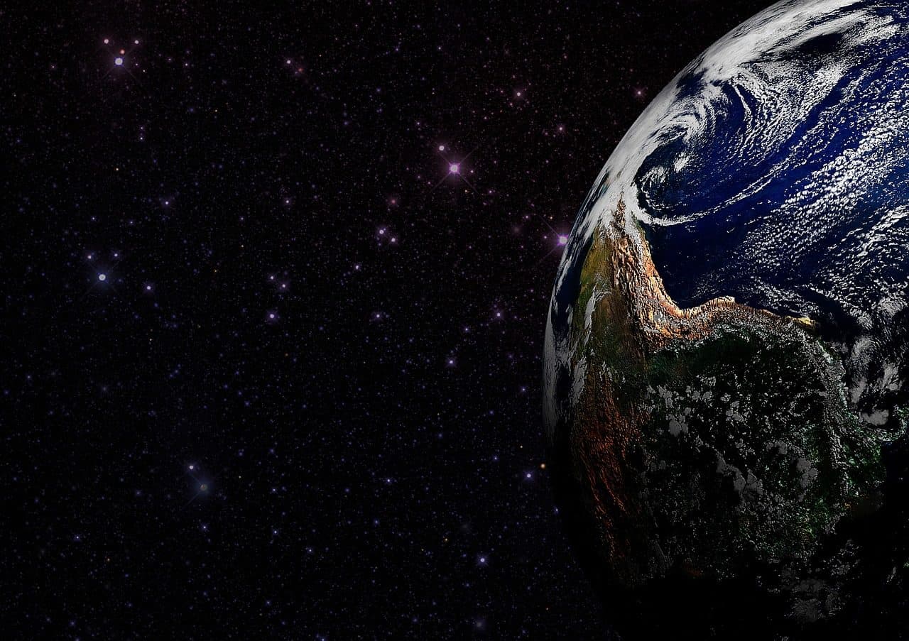 A digital map of the world overlaid with network connection lines